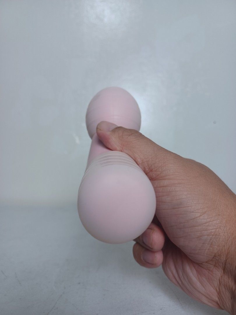 Mini Massager (Category: Massage Devices) located in Baguio. Submitted by restyrille77846 (Listing ID 1394081033, Image 3). Description: - Pink mini massager - USB charging port - Rounded head for targeted massage - Compact and portable design - Simple power button operation.