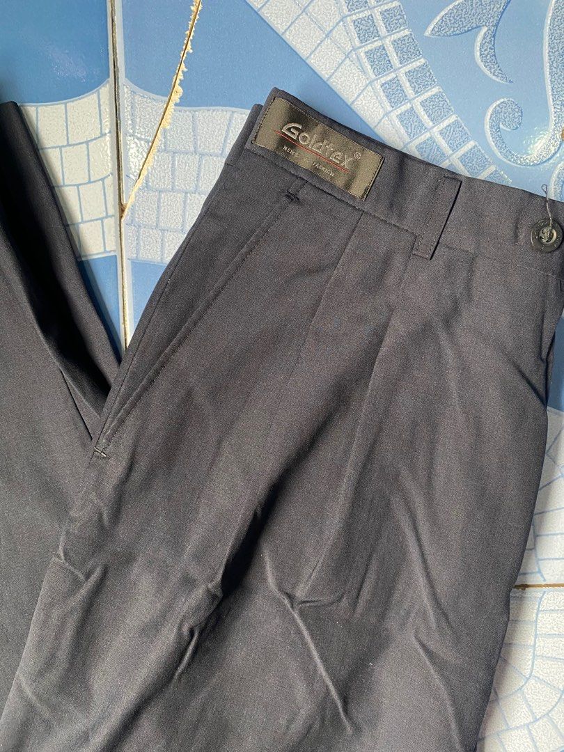 Navy Blue Trouser (Category: Trousers) located in Quezon City. Submitted by denjayc (Listing ID 1394047598, Image 2). Description: Waistline: 28 Leg Opening: 24 Length: 40 Issues: Check Pics.