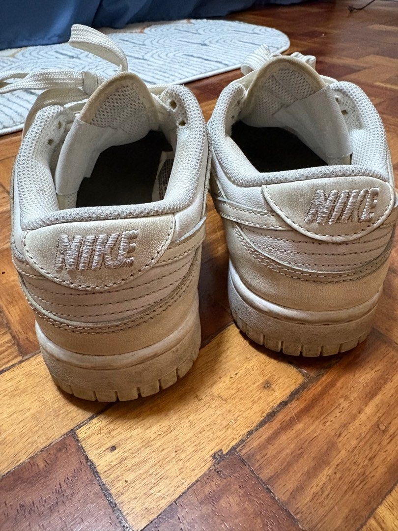 Nike Dunk Low for women (Category: Sneakers) located in Mandaluyong City. Submitted by mfp08 (Listing ID 1394027358, Image 2). Description: Nike Dunk low in 2 different colorway. First one - white with light yellow, size 36.5/23cm Second one - beige/nude/gold, size 36/22.5cm Take both for 1500php RFS: decluttering.