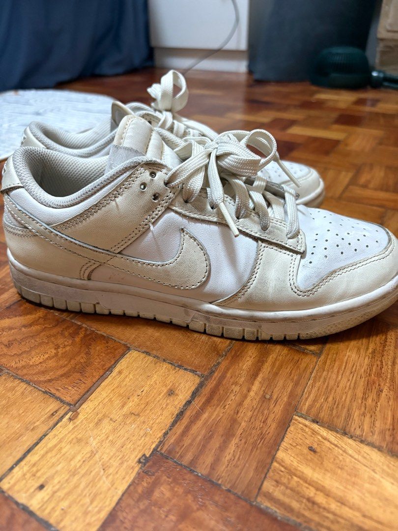 Nike Dunk Low for women (Category: Sneakers) located in Mandaluyong City. Submitted by mfp08 (Listing ID 1394027358, Image 3). Description: Nike Dunk low in 2 different colorway. First one - white with light yellow, size 36.5/23cm Second one - beige/nude/gold, size 36/22.5cm Take both for 1500php RFS: decluttering.