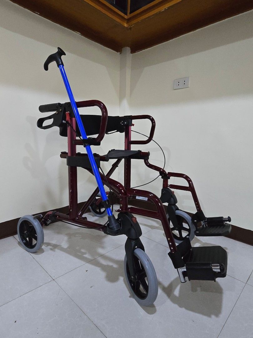 Rollator with wheelchair (Category: Wheelchairs) located in Cainta. Submitted by reabilty (Listing ID 1394198736, Image 1). Description: - Maroon folding wheelchair - Includes footrests - Features small wheels for maneuverability - Comfortable seat - Supportive backrest - Designed for easy folding and storage.