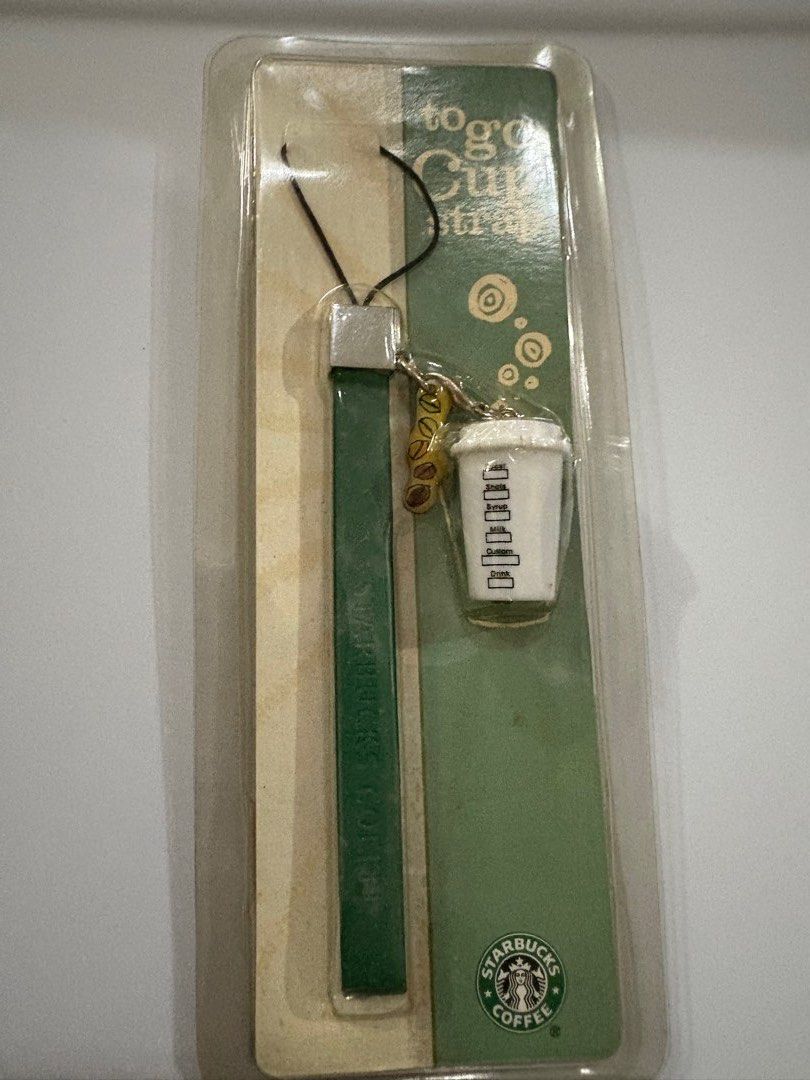 Starbucks collectibles - Mobile phone strap (Category: Mounts & Holders) located in Paranaque City. Submitted by shopofashopaholic (Listing ID 1394203804, Image 3). Description: Authentic, original Starbucks collectible merchandise Brand new, never used and still in their original packaging Prices is per item, discount if taking all. There are mobile phone holders, can also be used as bag charms.