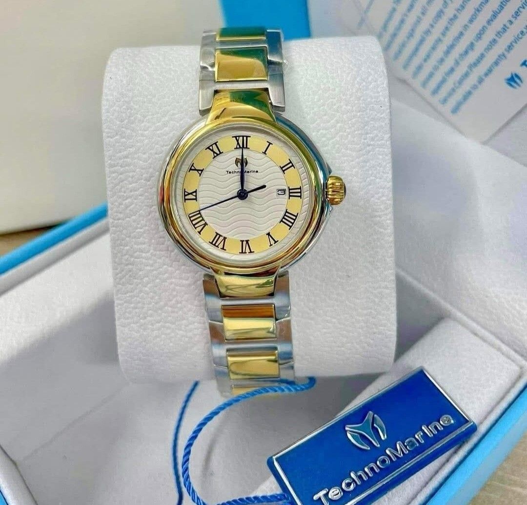 TechnoMarine Two Tone Yellow Gold and Silver Watch (Category: Women's Watches) located in Quezon City. Submitted by msgoldsgem (Listing ID 1385562183, Image 2). Description: Php 5,500 pesos plus shipping fee 💯 Original TechnoMarine Two-Tone Silver and Yellow Gold Round Analog Watch ⌚32mm Case Diameter ✅ All Stainless Steel 🚗 On hand and ready to ship! Don’t miss out on this deal 📸 Actual photos posted – What you see is what you get! 🎁 Perfect