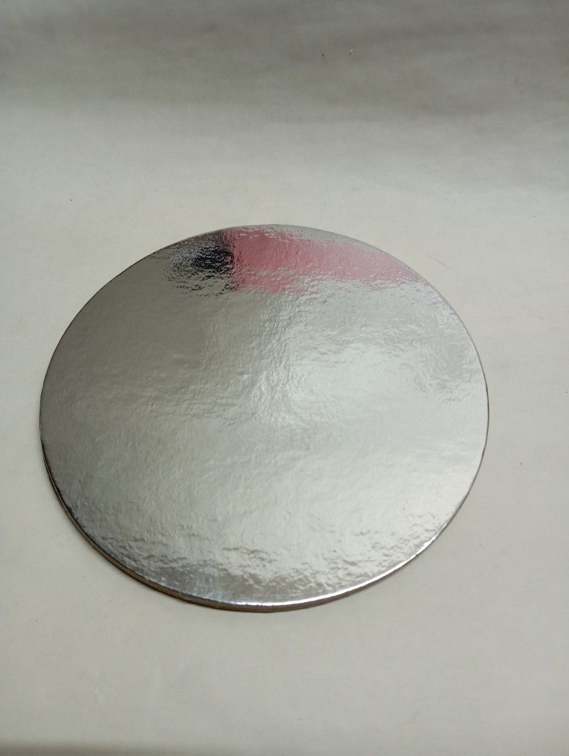 ( Take-all 4pcs ) 7" Silver Round Cake Boards (Category: Bakeware) located in Caloocan City. Submitted by littlequeenie (Listing ID 1394354987, Image 2). Description: - Silver round cake boards - Made of sturdy cardboard with a silver foil finish - Price: ₱30 take all - Perfect for supporting cakes and other baked goods - Great for bakeries and home bakers RFS: extras.