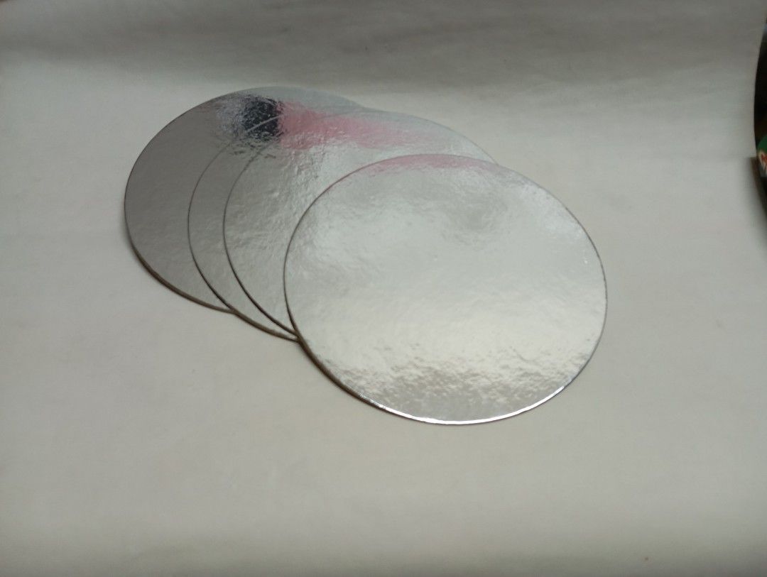 ( Take-all 4pcs ) 7" Silver Round Cake Boards (Category: Bakeware) located in Caloocan City. Submitted by littlequeenie (Listing ID 1394354987, Image 1). Description: - Silver round cake boards - Made of sturdy cardboard with a silver foil finish - Price: ₱30 take all - Perfect for supporting cakes and other baked goods - Great for bakeries and home bakers RFS: extras.