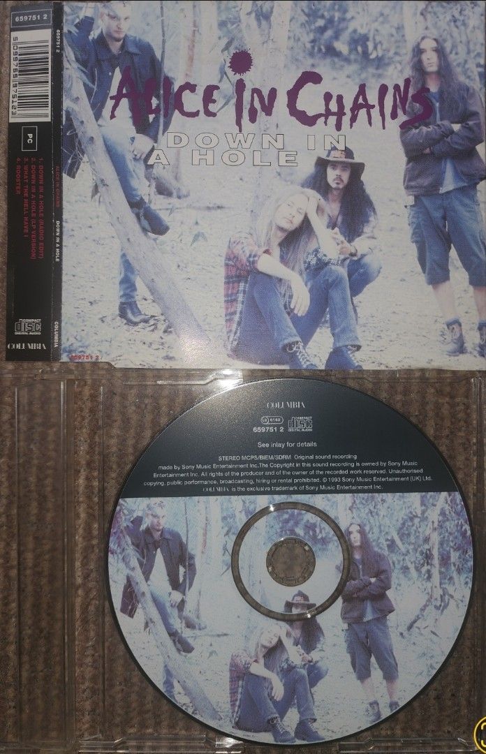 Alice In Chains - Down In A Hole (Category: CDs & DVDs) located in Cebu City. Submitted by g_roshamboo (Listing ID 1394396491, Image 2). Description: - Alice in Chains "Down in a Hole" CD - Features the tracks: "Down in a Hole (Radio Edit)", "What the Hell Have I", and "Rooster" - Tracklist and lyrics are on the back of the case - Manufactured by Sony Music Entertainment.