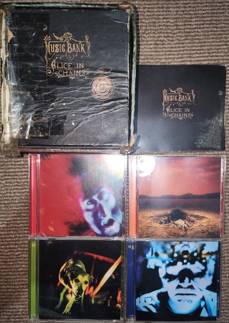 Alice in Chains - Music Bank Box Set (Category: CDs & DVDs) located in Cebu City. Submitted by g_roshamboo (Listing ID 1394396160, Image 2). Description: 4 Cd. Box is heavily taped. with writings on the box. Disc 3 is heavily used and will skip on the latter part Comes with the booklet.