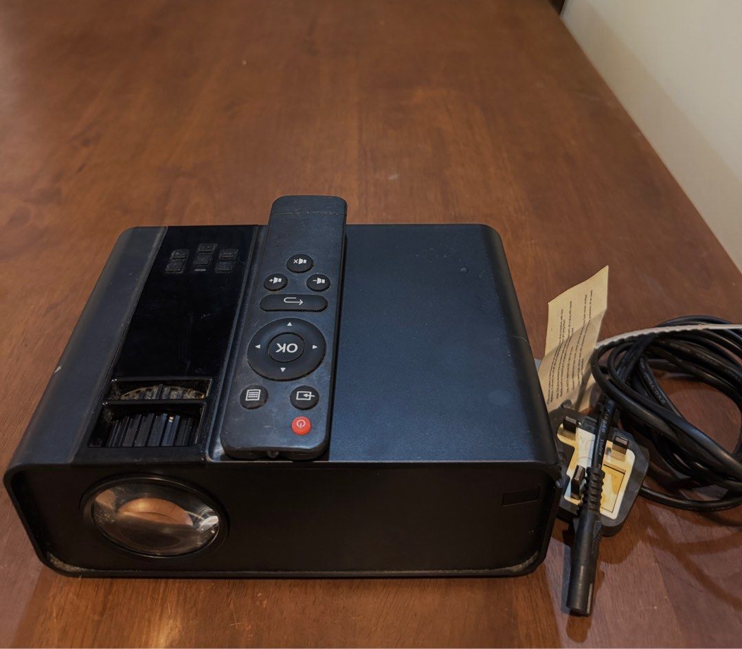 Android version Projector (Category: Portable Audio Accessories) located in Pulau Langkawi. Submitted by raden.ird (Listing ID 1394221955, Image 1). Description: Come without stand. - Built in speaker and easy to connect with Wifi. - come with remote but cover at battery missing. - PM me to see the quality video/colour/ sound.