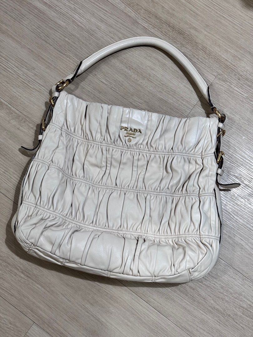 Authentic Prada bag (Category: Luxury Bags & Wallets) located in Quezon City. Submitted by yojxyoj (Listing ID 1394337209, Image 1). Description: 101% authentic prada nappa gaufre ivory.