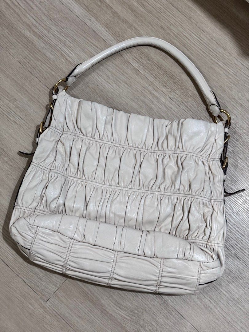 Authentic Prada bag (Category: Luxury Bags & Wallets) located in Quezon City. Submitted by yojxyoj (Listing ID 1394337209, Image 2). Description: 101% authentic prada nappa gaufre ivory.