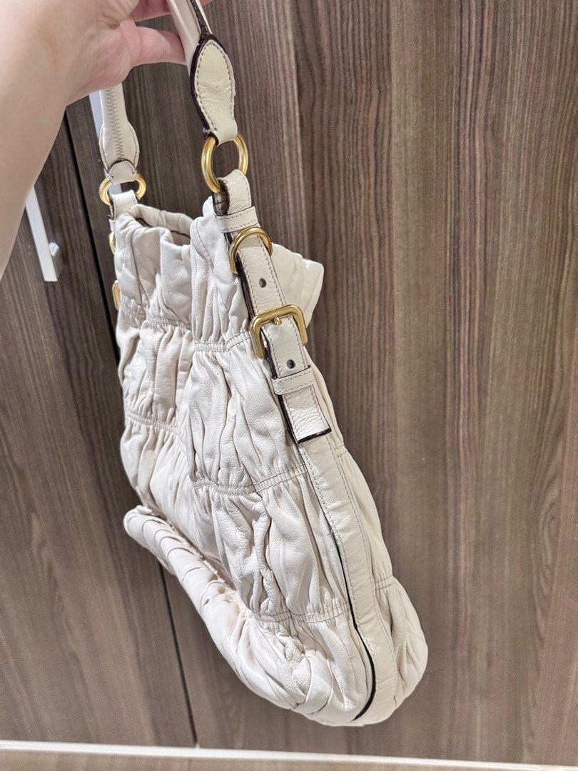 Authentic Prada bag (Category: Luxury Bags & Wallets) located in Quezon City. Submitted by yojxyoj (Listing ID 1394337209, Image 3). Description: 101% authentic prada nappa gaufre ivory.