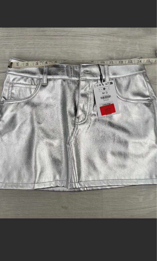Bershka Silver Skirt (Category: Skirts) located in Manila. Submitted by philocalyph (Listing ID 1394372359, Image 2). Description: Tag removed original 1,295.