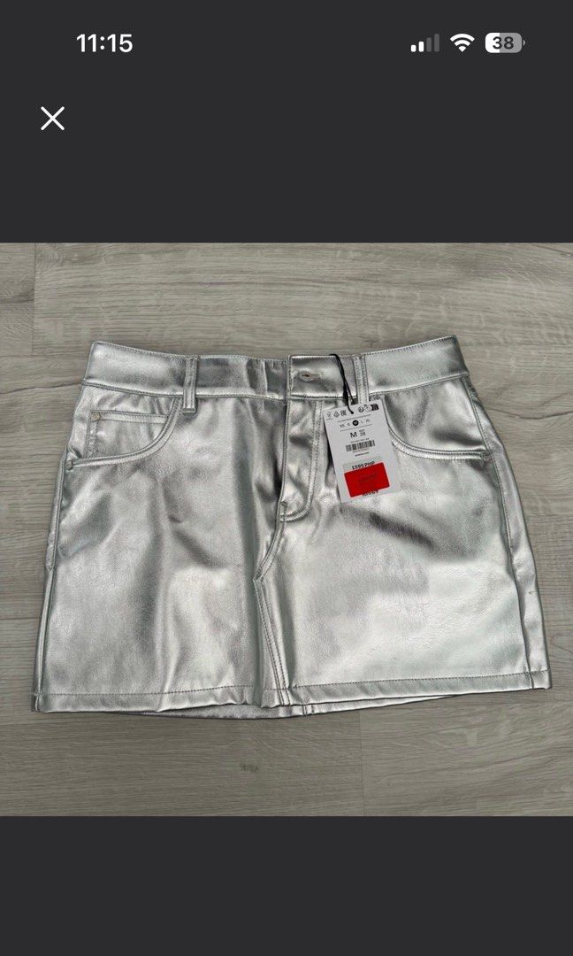 Bershka Silver Skirt (Category: Skirts) located in Manila. Submitted by philocalyph (Listing ID 1394372359, Image 1). Description: Tag removed original 1,295.