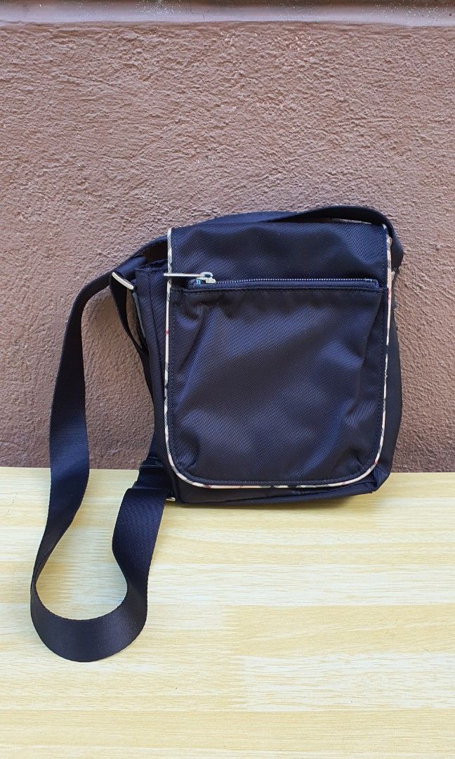 Burberry slingbag (Category: Luxury Bags & Wallets) located in Antipolo. Submitted by switchneighborhood (Listing ID 1394369993, Image 1). Description: authentic check pics to appreciate its condition.