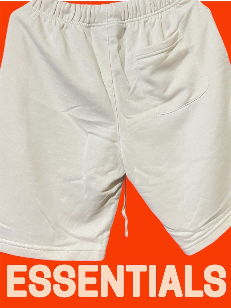 ESSENTIALS (Fear of God) (Category: Shorts) located in Valenzuela. Submitted by gotdrip (Listing ID 1394358068, Image 2). Description: Stay comfortable and stylish with these authentic Fear of God Essentials Shorts. Designed with a relaxed fit, premium cotton blend, and elastic waistband with adjustable drawstrings, these shorts deliver both luxury and everyday wearability. Size: Small (fits medium) ✅ Color: Off White / Cream ✅ Features: • Elasti