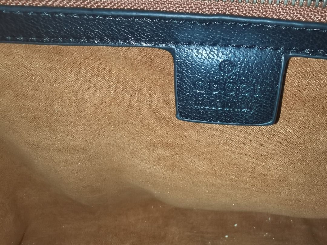 Gucci ophidia tote bag (Category: Luxury Bags & Wallets) located in Caloocan City. Submitted by lux_sellier (Listing ID 1394193076, Image 3). Description: - Authentic Gucci handbag - with strap - Iconic GG monogram pattern - Green and red stripe detail - Black accents - Medium size - Two top handles - Classic and recognizable design - Ideal for everyday use 8/10 condition malfunctioning zipper sometimes, rip near handle.