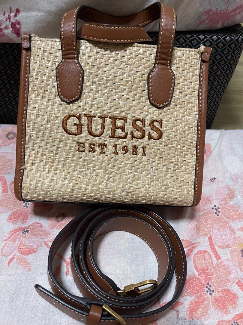 Guess Silvana Straw Mini Tote (Category: Shoulder Bags) located in Quezon City. Submitted by mythingsandeverything (Listing ID 1394332651, Image 2). Description: FOR SALE!! Brand: Guess Origin: Japan Color: Brown - Silvana Mini Woven Handbag .