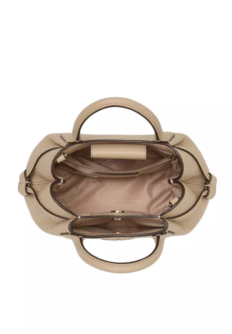 KATE SPADE - Dumpling Mini Satchel (Category: Luxury Bags & Wallets) located in Paranaque City. Submitted by lilithinleo (Listing ID 1394258326, Image 3). Description: Brand new. The color is trendy and unique, this is perfect to style with maxi dresses/floral skirts/ruffle blouses. The wallet/card holder is sold separately. :) The bag’s original retail price is 17K. .