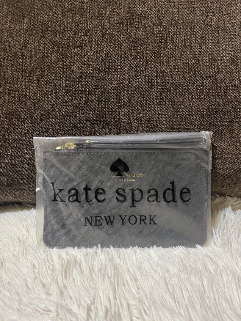 Kate Spade Wristlet 5x8 Inches (Category: Clutches) located in Mandaluyong City. Submitted by elegancce (Listing ID 1394258124, Image 3). Description: 💯 SUPER SALE! ✈️ Package from Abroad 📸 Actual Picture Posted Kate Spade Wristlet with Price Tag 🏷 Dimensions: 5" (H) X 8" (W) Our Price - P 199 ONLY! Mall price - $88 - P 3,538.