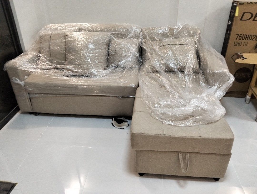 L-Shaped Sofa with Storage (Made to Order) (Category: Sofas) located in Bulacan. Submitted by itsmonico391240 (Listing ID 1394397353, Image 2). Description: - L-shaped sofa - Neutral beige color - Built-in storage compartments - Includes cushion - Covered in protective plastic wrap - Modern design - Suitable for various living room layouts made to order only location san rafael bulacan With Down Payment -Fb acc Monico P. Nayre 📞09361096423.