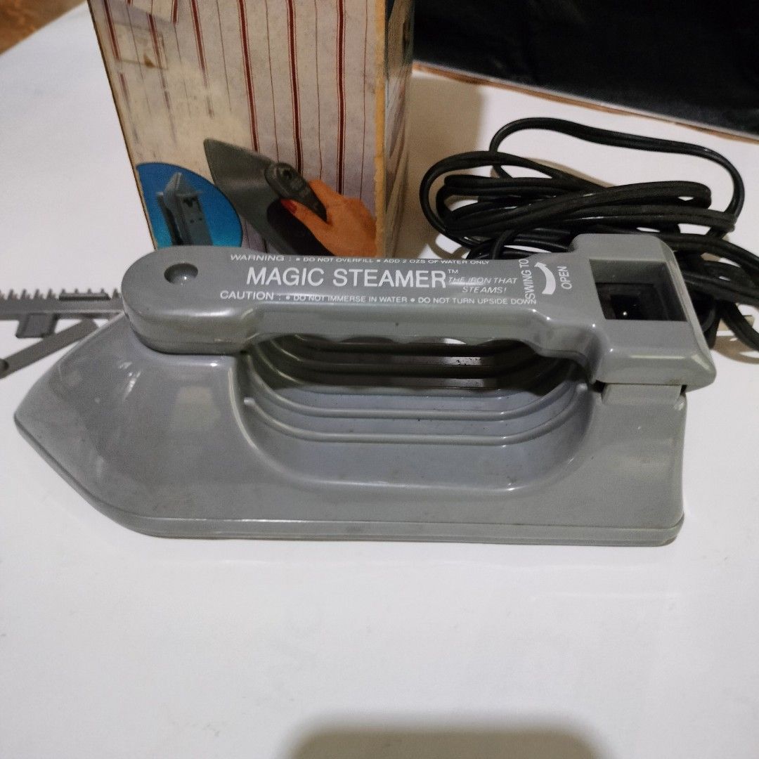 Magic Steamer Clothes Steamer (Category: Irons & Steamers) located in Pasig City. Submitted by hapibibiness (Listing ID 1394232746, Image 3). Description: 👖👕🎽👚👔👗👘🥻🧣🧥🥼🩳🦺👗🩱 Get wrinkle-free clothes in seconds with the Magic Steamer! This handy steamer won't burn or scorch your fabrics. Includes steamer and attachment. Colorful box. .