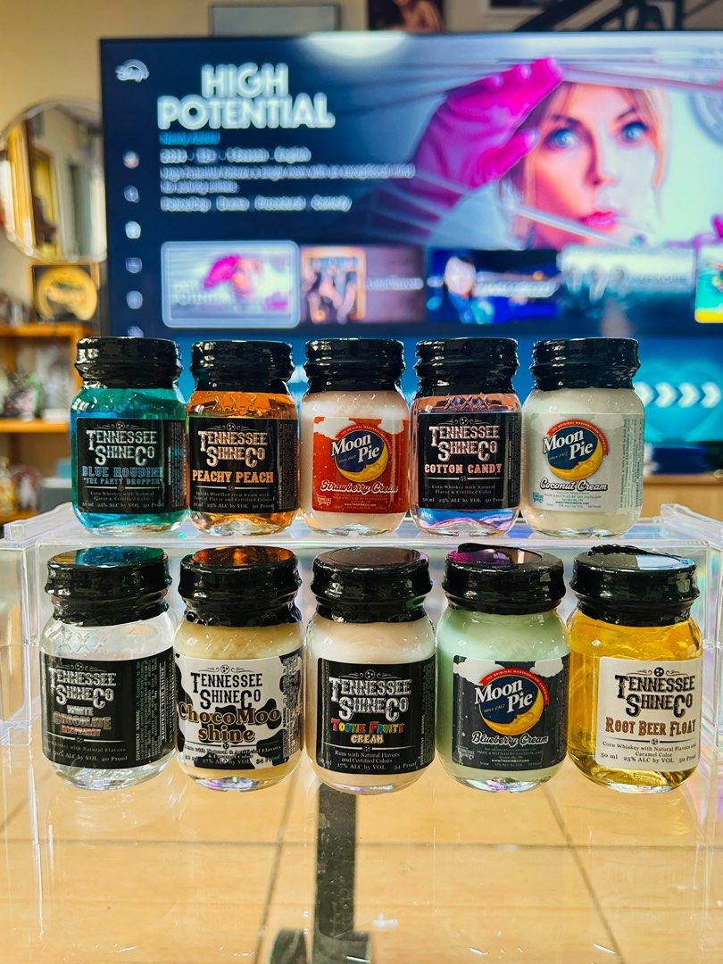 32pcs Moonshine Set. Miniature liquor bottles (Category: Beverages) located in Antipolo. Submitted by TheDaxCollectibles (Listing ID 1394377666, Image 3). Description: Directly acquired from Tennessee. Variety of whisky moonshine flavors. Comes with a wooden crate. 32 assorted flavors.