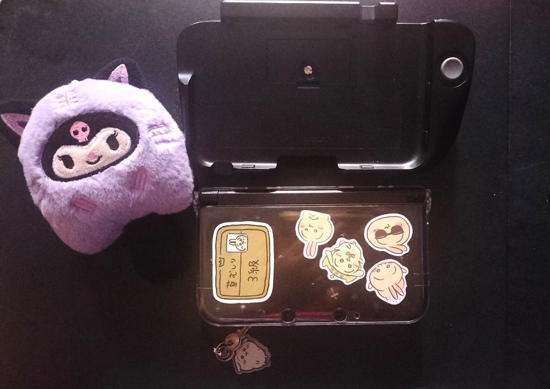 Nintendo 3DS LL (Category: Nintendo) located in Angono. Submitted by pricefield4ever (Listing ID 1394286489, Image 2). Description: Nintendo 3DS LL – ⚫🖤 Looking for a new home for my well-loved 3DS LL! (´｡• ᵕ •｡`) It’s in good condition and fully playable~ Luma 13.3.3 CFW with tons of homebrew apps: Twilight Menu, FourthTube, Korg, etc. Inclusions: ♡ 128GB SanDisk Extreme SD card included ♡ With Circle Pad Pro & original charger + japanese charg