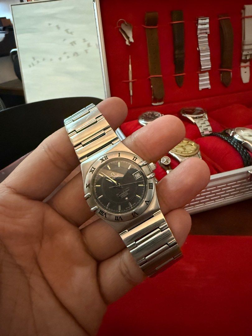 Omega Constellation Perpetual Calendar (Category: Luxury Watches) located in Makati City. Submitted by gentsrackmnl (Listing ID 1394230706, Image 1). Description: Reference 1552.40.00 Case diameter: 35.5 mm Case: Steel Dial Color: Grey Crystal: Domed, scratch‑resistant sapphire crystal with anti‑reflective treatment inside Water resistance: 5 bar (50 metres / 165 feet) Watch size: Gents Total product weigh: (approx.)100 g Calibre OMEGA 1680 Therm