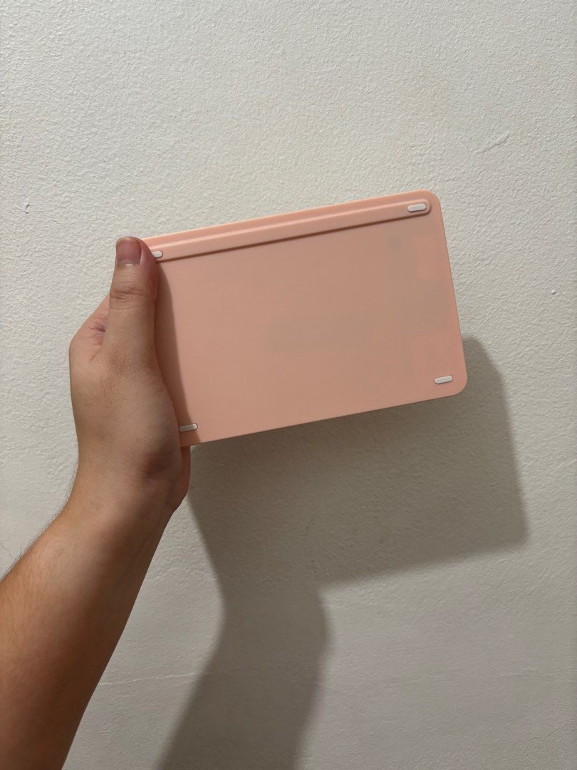 Pink bluetooth portable keyboard (Category: Computer Keyboard) located in Imus. Submitted by sunnysidetrades (Listing ID 1394358495, Image 3). Description: Bought it for a temporary use but finally got my desired keyboard. Yes, it connects to ipad..