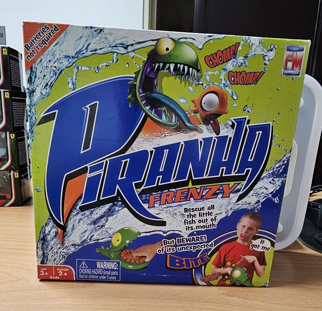 Piranha Frenzy Board Game (Category: Board Games & Puzzles) located in Caloocan City. Submitted by jho0618 (Listing ID 1394236355, Image 3). Description: - Piranha Frenzy board game! - Features a hungry piranha and little fish. - No batteries required. MOP GCash MOD J&T or Lalamove .
