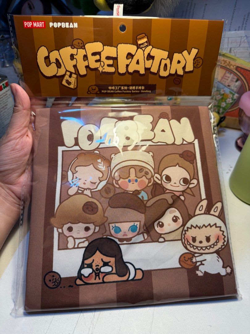 Pop Mart Pop Bean Coffee Factory Handbag (Category: Tote Bags) located in Quezon City. Submitted by slslcshop5 (Listing ID 1394365090, Image 2). Description: Brandnew and sealed from Popmart official 2 pcs on hand.