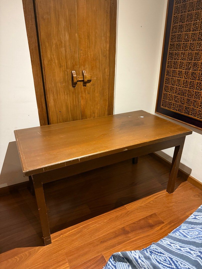 Solid wood table (Category: Tables & Sets) located in Petaling Jaya. Submitted by submarinenia (Listing ID 1394373746, Image 2). Description: A large, solid wood desk — very sturdy and heavy. It shows some wear and could use a little TLC, but it has plenty of character and charm..