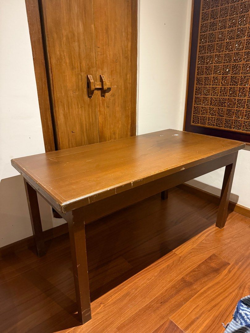 Solid wood table (Category: Tables & Sets) located in Petaling Jaya. Submitted by submarinenia (Listing ID 1394373746, Image 1). Description: A large, solid wood desk — very sturdy and heavy. It shows some wear and could use a little TLC, but it has plenty of character and charm..
