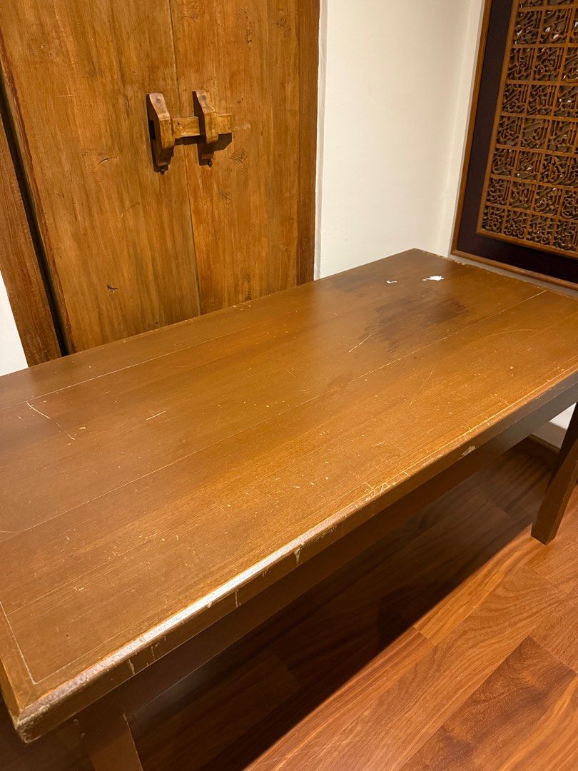 Solid wood table (Category: Tables & Sets) located in Petaling Jaya. Submitted by submarinenia (Listing ID 1394373746, Image 3). Description: A large, solid wood desk — very sturdy and heavy. It shows some wear and could use a little TLC, but it has plenty of character and charm..