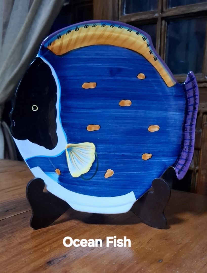 Studio Nova Fish Shaped Dinner Plates 10" Ocean Fish (Category: Dinnerware & Cutlery) located in Quezon City. Submitted by m_decluttering_sale (Listing ID 1394321609, Image 1). Description: Studio Nova Fish-Shaped Decorative Plate – Collectible 🐠✨ Brand: Studio Nova Design/Pattern: Ocean and-painted look) Material: Ceramic/Porcelain Colors: Blue base with black, yellow, orange, white, and purple accents Shape: Fish-shaped plate Size: Approximate