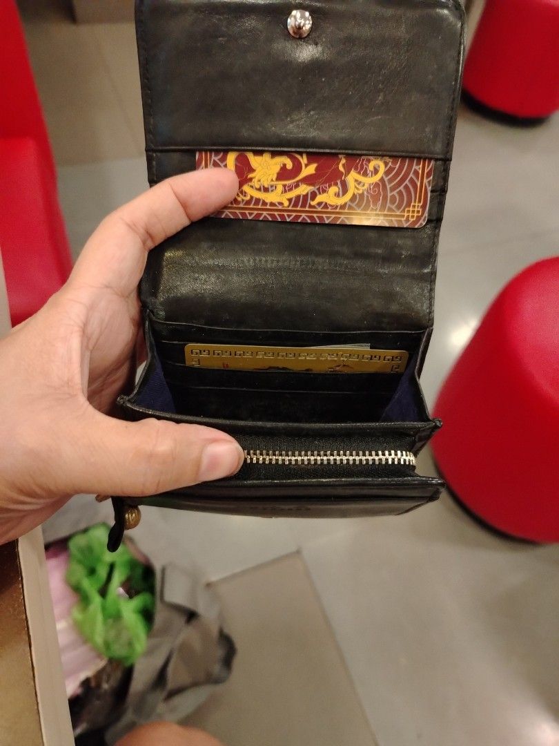 Agnes B. Voyage Star Wallet (Category: Luxury Bags & Wallets) located in Manila. Submitted by purediamond888 (Listing ID 1394499522, Image 3). Description: - Black Agnes B. Voyage wallet - Star pattern - Multiple card slots - Coin compartment - Snap closure - Blue interior lining - Made in China.