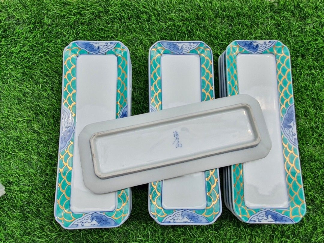 Arita Long Sushi Plates (13 pcs) (Category: Dinnerware & Cutlery) located in Quezon City. Submitted by sgoecss005 (Listing ID 1394559511, Image 2). Description: Visible minor flaws can be seen (Some scratches/gold rub).
