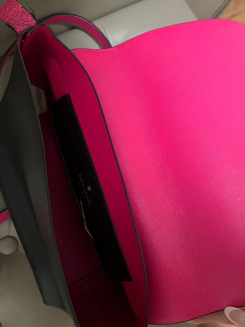 Authentic Kate Spade Black and Pink Handbag (Category: Luxury Bags & Wallets) located in Quezon City. Submitted by xxccc92 (Listing ID 1394516856, Image 2). Description: - Black Kate Spade handbag - Pink interior - Adjustable strap - Flap closure with gold-tone logo - Interior pocket - Leather material.