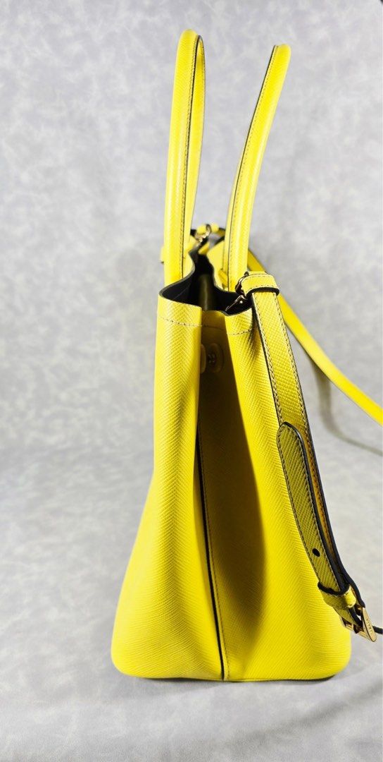 Authentic Prada Saffiano Cuir Girasole (Category: Luxury Bags & Wallets) located in Taguig. Submitted by luxchelry (Listing ID 1394500980, Image 3). Description: Saffiano Cuir Medium Girasole ♦️Comes with strap, authenticity card, carecard and dustbag ♦️8.8/10 ♦️Any discoloration is due to lighting only. ✨️P30000✨️ All items are 100% authentic. We offer money back if the item is proven fake. Disclaimer: All product names, logos, brands and other 