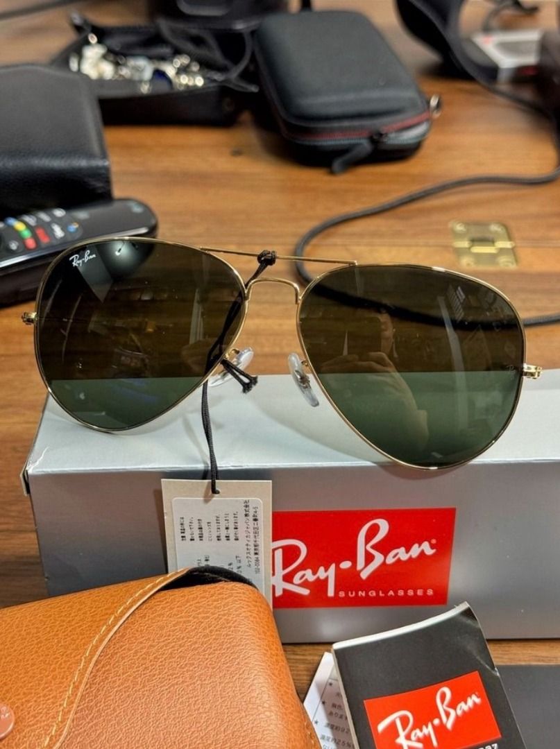 Authentic RayBan Aviator RB3026 / L2846 62mm (Category: Sunglasses & Eyewear) located in Makati City. Submitted by ukitake12 (Listing ID 1394576002, Image 2). Description: Reason for Selling: Gifted to me but I don't really wear shades a lot. I work graveyard and hardly outdoors during the day. Brand: Rayban Gender: Unisex Shape: Aviator Frame Color: Gold Full size: 62 Material: Metal Frame Style: Full Rim SRP Price: PHP 11,500 Reference: You can