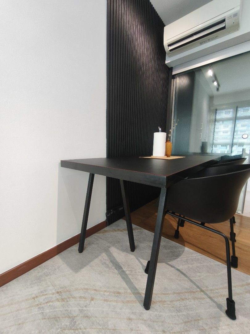 Dining Table (Category: Tables & Sets) located in Singapore. Submitted by ___momlife (Listing ID 1394483766, Image 2). Description: - Stylish black dining table - Heavy - Chairs not included - Sleek, modern design with matte finish - Comes with customised table mat - Well-maintained and ready for use - Arrange own delivery.