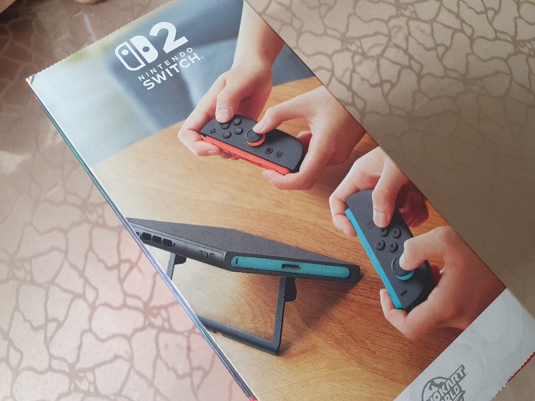 Bnew Nintendo Switch 2 + Mario Kart World (Category: Nintendo) located in Manila. Submitted by kiddgamer (Listing ID 1394416629, Image 3). Description: Bnew unit. Bought abroad. Complete accessories plus mario kart world digital game. Can be picked up or delivered thru Lbc Grab or Lalamove. Please confirm my legitimacy via my feedback. .