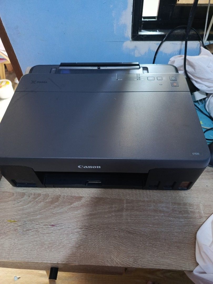Canon G1020 Ink Tank Printer (Category: Printers, Scanners & Copiers) located in Manila. Submitted by isharishni33773 (Listing ID 1394521311, Image 3). Description: - Canon G3010 Ink Tank Printer - In good working condition - Features: - Built-in ink tank system - Flatbed scanner - Control panel - Color: Black - Includes paper tray Issue: Need palitan ang cartridge pero after nun super smooth gamitin upto 250gsm ang kaya..