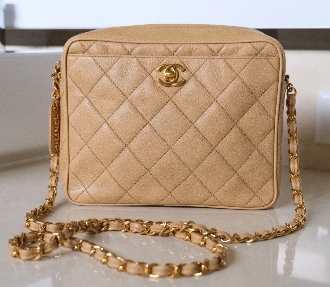 Chanel Quilted Crossbody Camera Bag (Category: Luxury Bags & Wallets) located in Candon. Submitted by curatedlux.ph (Listing ID 1394597601, Image 2). Description: - Authentic Chanel Crossbody Bag - Beige color - Quilted design - Gold chain strap - Zip closure - Leather Chanel logo tag - Rectangular shape - Includes serial number sticker.