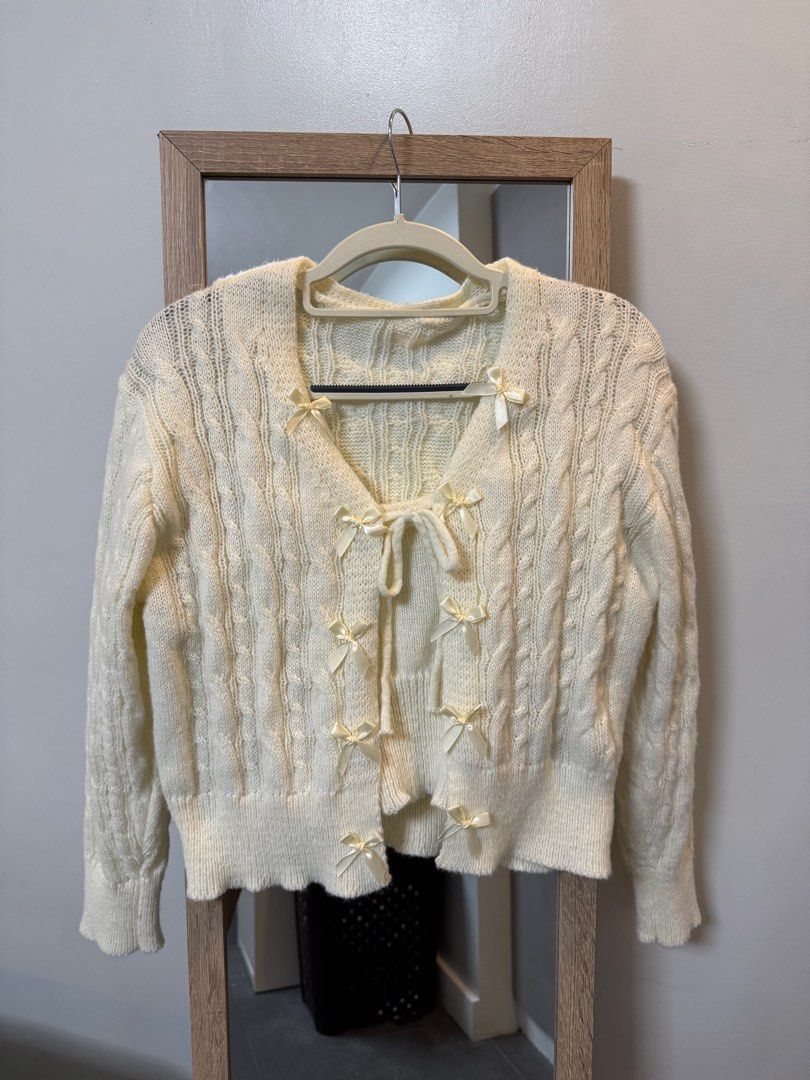 Coquette Cardigan (2 pieces) (Category: Coats, Jackets and Outerwear) located in Makati City. Submitted by sphpnd (Listing ID 1394531431, Image 1). Description: Coquette Cardigan with inner —super cute & coquette design 🎀 —wool cardigan that comes with a wool sando (you can buy the cardigan only) —got it from hk! 📍 Makati/Paranaque 〰️ Meet up: Ayala Malls Manila Bay 📩 PM if interested!.