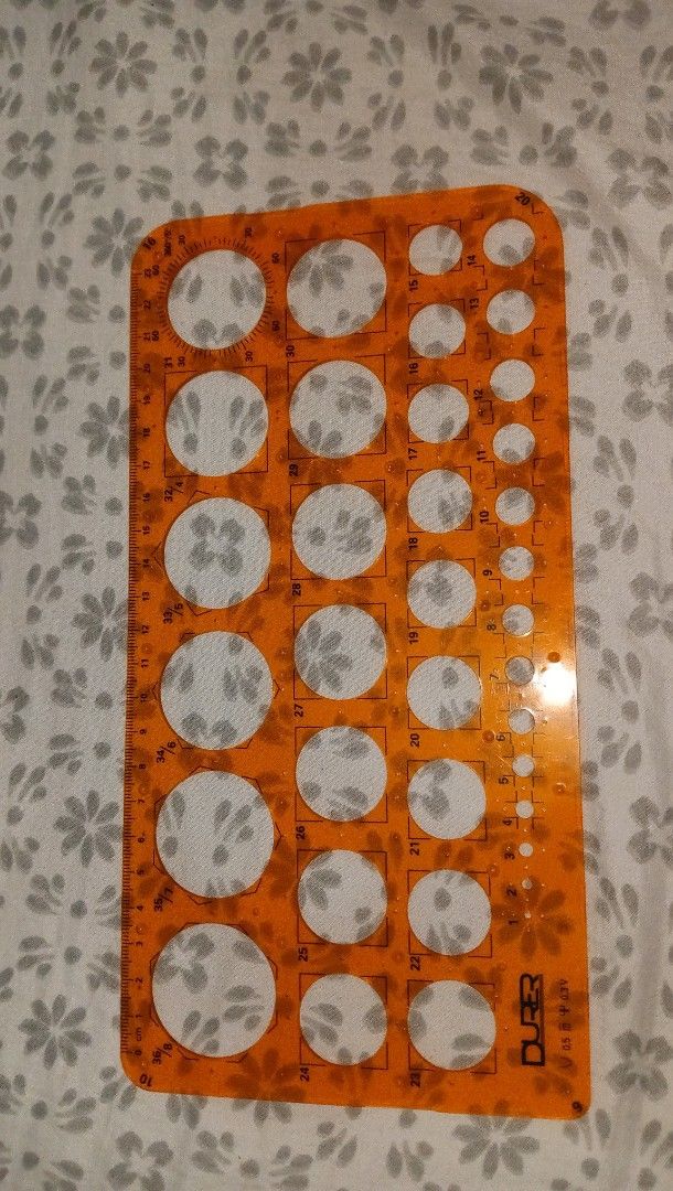 Durer Circular Template 1-36mm D5580 (Category: Craft Supplies & Tools) located in Makati City. Submitted by rbbql (Listing ID 1394558932, Image 1). Description: (check my other listings for set of drafting materials) - Orange Durer circle template - Includes various circle sizes - Features measurements for precision - Made of durable plastic - Perfect for artists and designers or engineering and architectural students .
