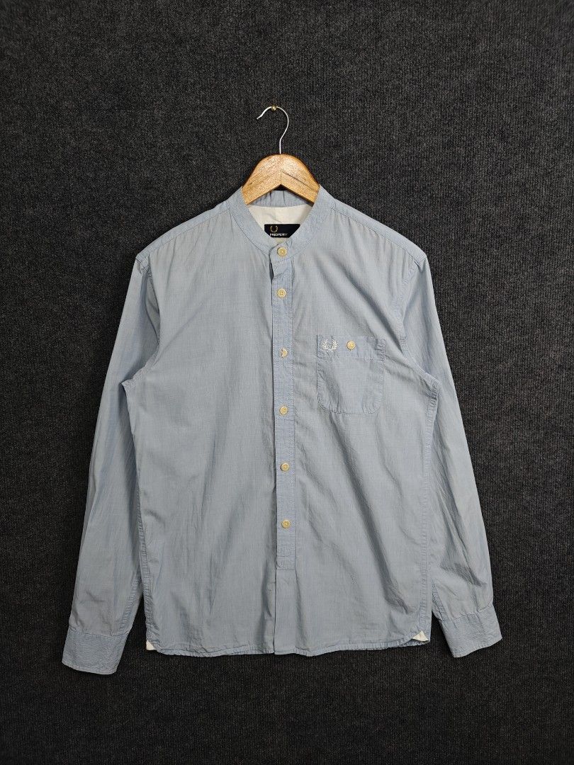 Fred Perry Band Collar Shirt (Category: Activewear) located in Alaminos. Submitted by epargne (Listing ID 1394416052, Image 1). Description: Fred Perry Band Collar Shirt Size: Medium Length: 28 Armpit to Armpit/Width: 20 Condition: Vgood ! Color Rate: 9/10 Issue: Basag ang butones, may extra sa washtag palitan niyo nalang. WASHED AND READY TO WEAR 👕.