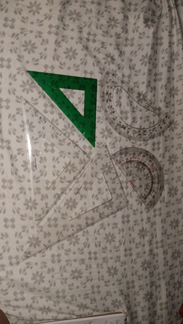 Geometry Set - Triangle Rulers and Protractors (Category: Stationery & School Supplies) located in Makati City. Submitted by rbbql (Listing ID 1394560767, Image 1). Description: - (2) 45 90 degree triangle - (1) 30 60 degree - (2) Protractor check my other listing for set of drafting materials - Geometry set includes triangle rulers and protractors. - Features a green triangle ruler and clear plastic protractors. - Perfect for students and projec