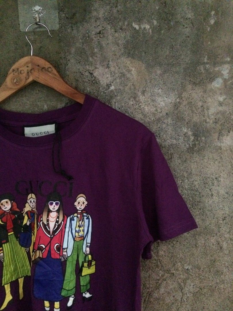 GUCCI RUNWAY MODEL GIRLS (Category: Shirts) located in Naga. Submitted by mojojojooohitzzz (Listing ID 1394558655, Image 2). Description: RUBBERIZE PRINT VIOLET TEE! Size : L on tag Dimes : 20 x 25 Color rate : 10/10 Issue : none Excellent Condition Sobrang bago pa! Location : Bicol Naga City MOP: Gcash only ( Payment First ) Courier : J&T Express.