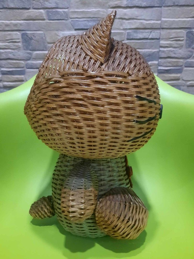 Hello Kitty Woven Basket (Category: Storage Boxes & Baskets) located in Quezon City. Submitted by threetwotwo2ndaccount (Listing ID 1394452449, Image 3). Description: - Vintage Kitty basket - Made of woven material - Features Kitty's face, bow, and flower - From Sanrio, Tokyo, Japan (1976-1999) - Approximately 15 inches tall.